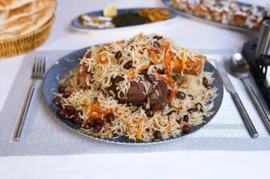 Afghan rice and lamb dish presented in a restaurant website